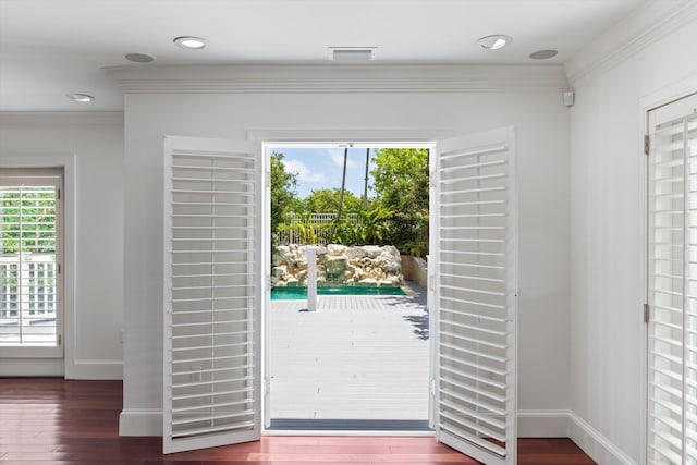 413 Emma St Unit A, Key West, FL 33040 - doorway featuring dark wood-type flooring and ornamental molding