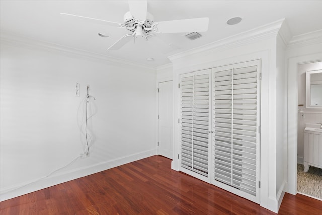 413 Emma St Unit A, Key West, FL 33040 - unfurnished bedroom featuring wood finished floors, ornamental molding, a closet, and ceiling fan