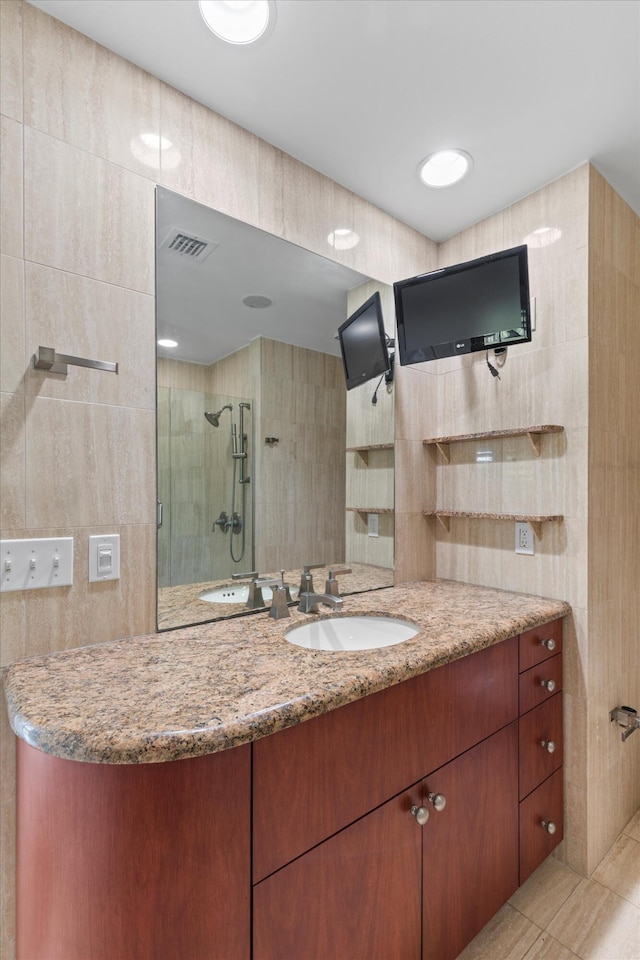 413 Emma St Unit A, Key West, FL 33040 - full bathroom featuring vanity, a shower stall, and tile patterned flooring