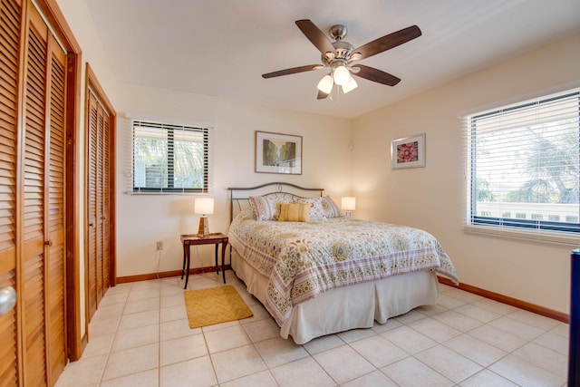 bedroom featuring ceiling fan and light tile patterned floors