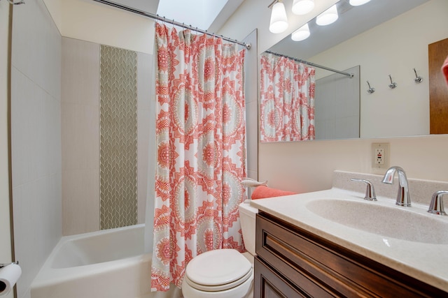 full bathroom featuring vanity, shower / bath combination with curtain, and toilet