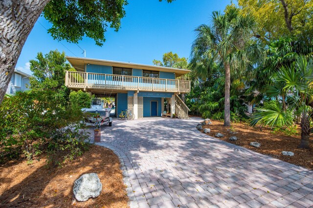 front of property with a carport