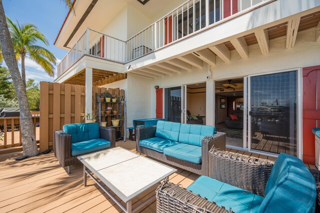 wooden deck featuring an outdoor hangout area