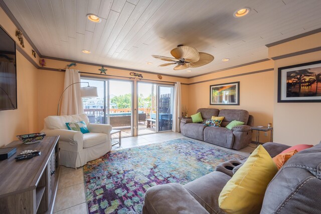 tiled living room featuring ceiling fan, ornamental molding, and wooden ceiling