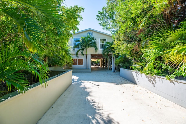 exterior space featuring a carport