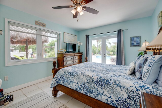 bedroom featuring light tile patterned flooring, access to exterior, ceiling fan, and french doors