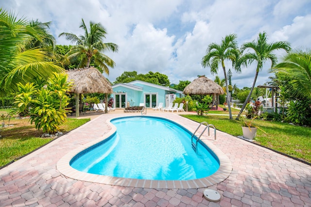 view of pool featuring a gazebo, a patio area, and a lawn