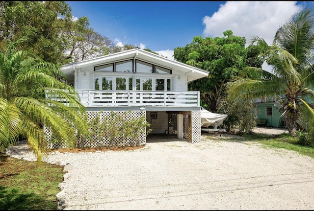 view of front of property with a carport