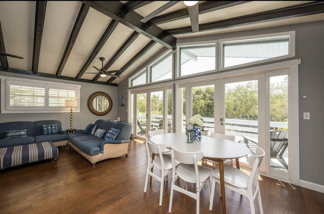 dining space with ceiling fan, lofted ceiling with beams, dark hardwood / wood-style floors, and french doors