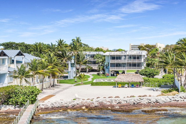 exterior space featuring a gazebo and a water view