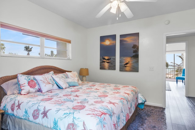 bedroom featuring dark hardwood / wood-style floors and ceiling fan