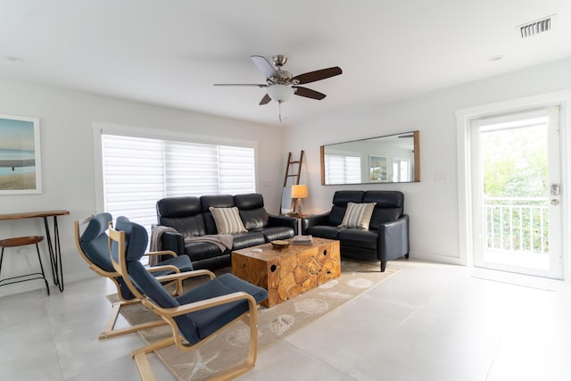 living room featuring ceiling fan