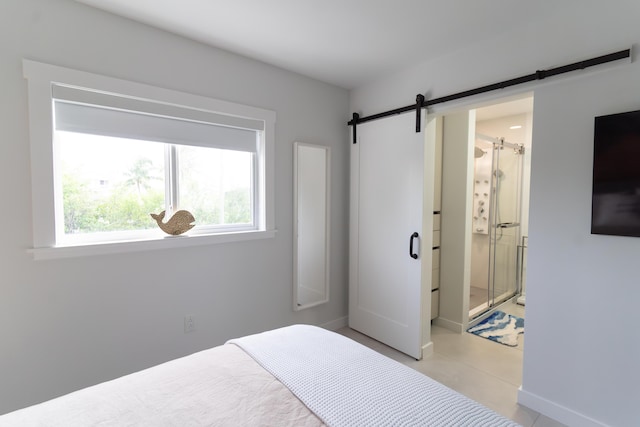 bedroom with a barn door