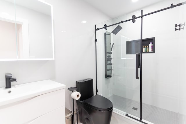 bathroom with a shower with shower door