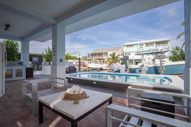 view of patio / terrace with a swimming pool