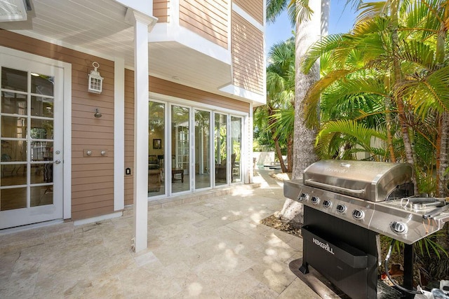 view of patio with a grill