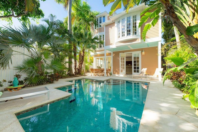 view of swimming pool with a patio area