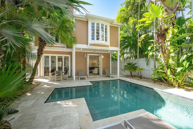 view of swimming pool with a patio