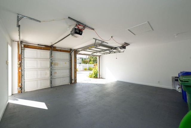 garage featuring a carport and a garage door opener