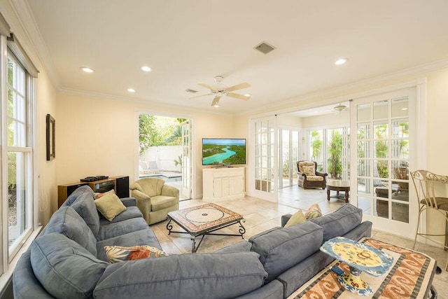 living room featuring french doors, ceiling fan, and ornamental molding