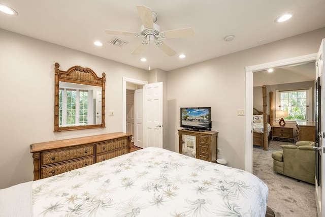 carpeted bedroom featuring ceiling fan