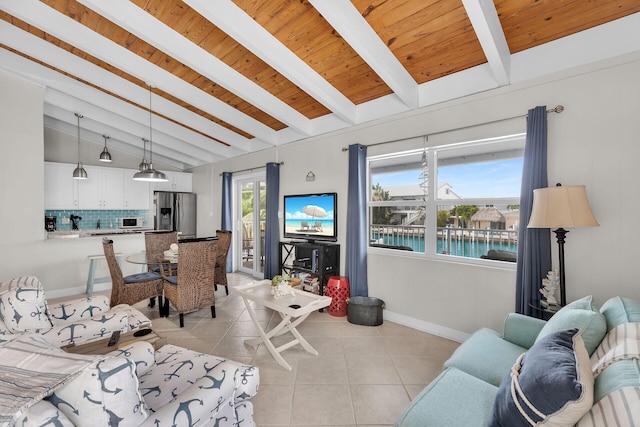 living room featuring vaulted ceiling with beams, wood ceiling, and light tile patterned flooring