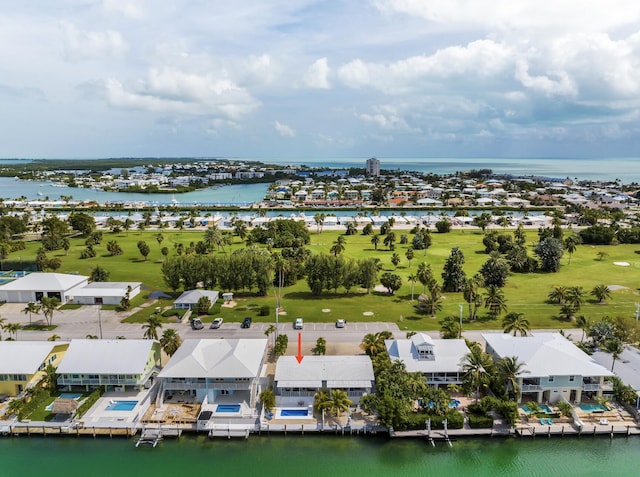 drone / aerial view with a water view