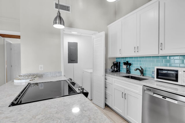 kitchen with sink, hanging light fixtures, electric panel, white cabinets, and stainless steel dishwasher