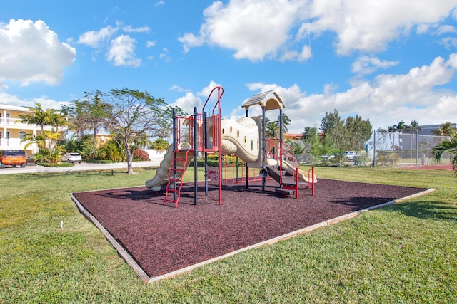 view of jungle gym featuring a yard