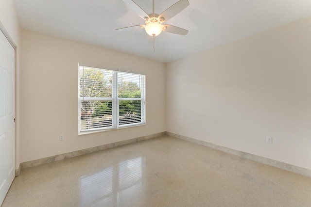 129 Tavern Dr, Tavernier, FL 33070 - unfurnished room featuring baseboards and ceiling fan