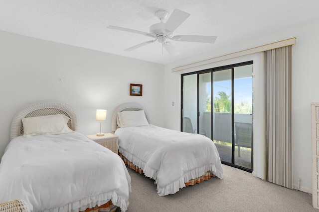 601 W Ocean Dr Unit 411C, Key Colony, FL 33051 - carpeted bedroom with access to exterior and ceiling fan
