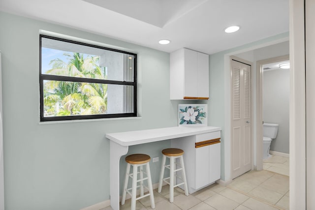 601 W Ocean Dr Unit 411C, Key Colony, FL 33051 - bar featuring baseboards and recessed lighting