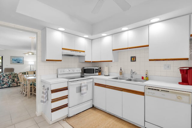 601 W Ocean Dr Unit 411C, Key Colony, FL 33051 - kitchen featuring white appliances, a ceiling fan, under cabinet range hood, a sink, and light countertops