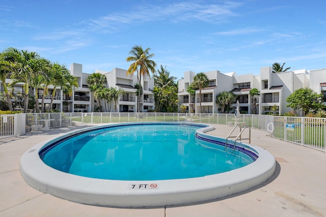 601 W Ocean Dr Unit 411C, Key Colony, FL 33051 - community pool with fence and a residential view