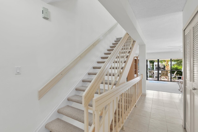 601 W Ocean Dr Unit 411C, Key Colony, FL 33051 - stairway with tile patterned flooring