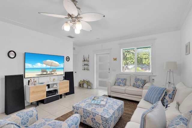 living room with ornamental molding, light tile patterned floors, and ceiling fan