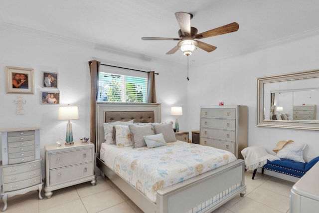 bedroom with ornamental molding, ceiling fan, and light tile patterned flooring