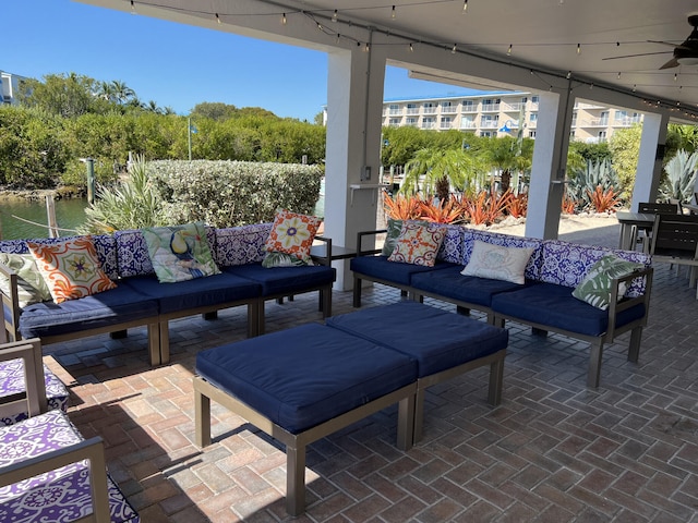 view of patio / terrace featuring outdoor lounge area and a ceiling fan
