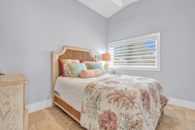 bedroom featuring lofted ceiling