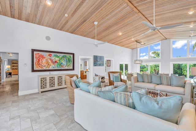 living room featuring wood ceiling, high vaulted ceiling, and ceiling fan