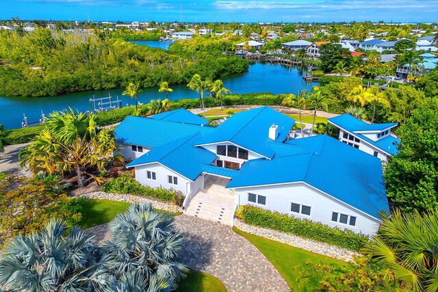 bird's eye view with a water view