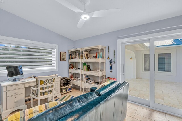 office area featuring lofted ceiling and ceiling fan