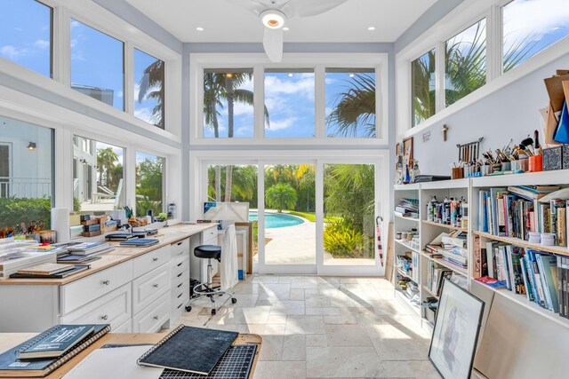 office space featuring a towering ceiling