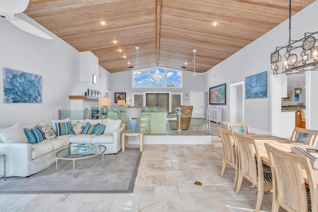 living room featuring a chandelier, high vaulted ceiling, and wooden ceiling