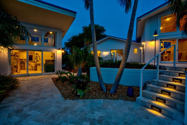 view of patio at twilight