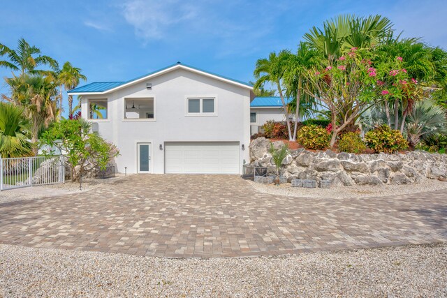 view of front of property with a garage