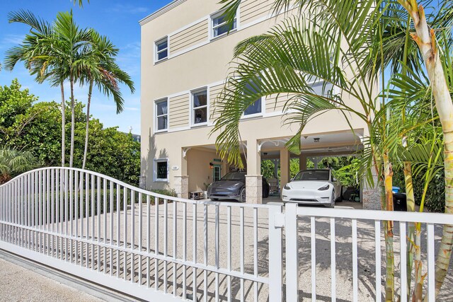 exterior space with a carport