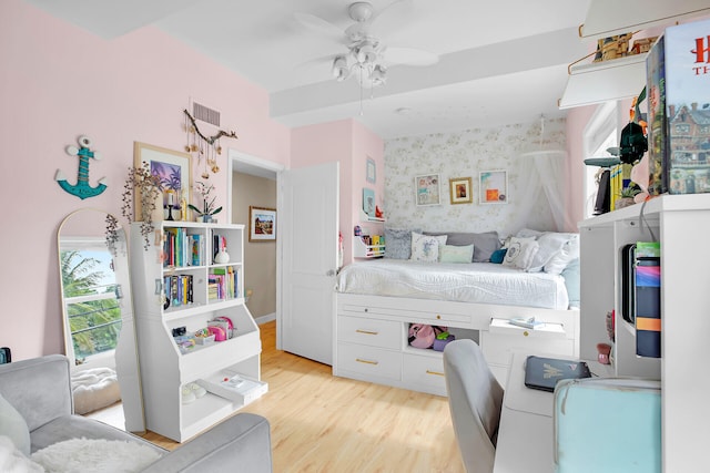 bedroom featuring ceiling fan and light hardwood / wood-style floors