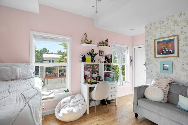 bedroom featuring a closet and light wood-type flooring