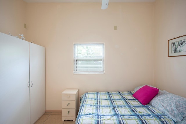 bedroom featuring light tile patterned floors